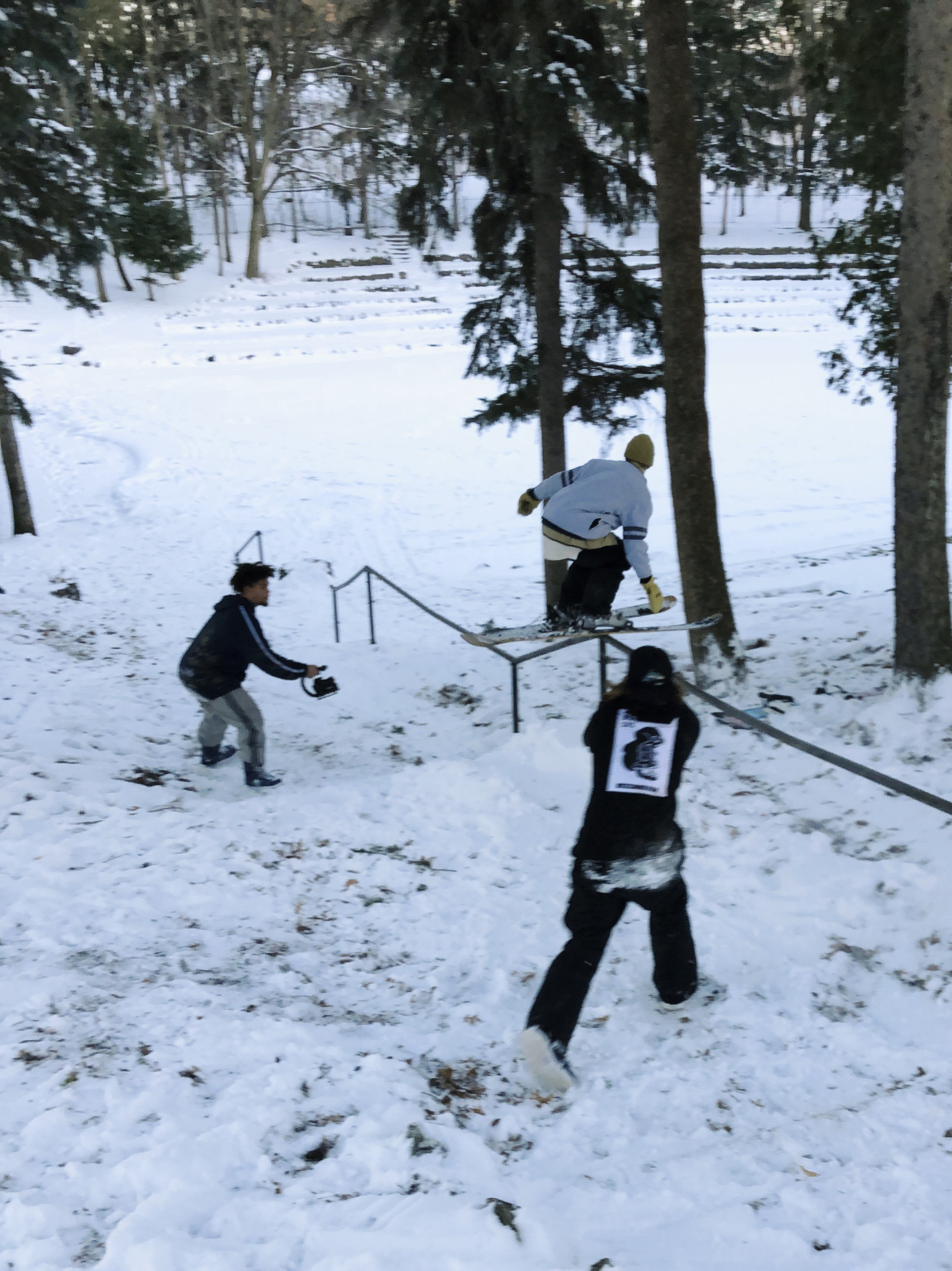 Skier jumping over other Skier